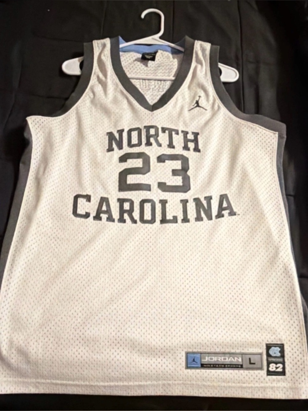 Jordan White and Gray North Carolina 23 Basketball Jersey